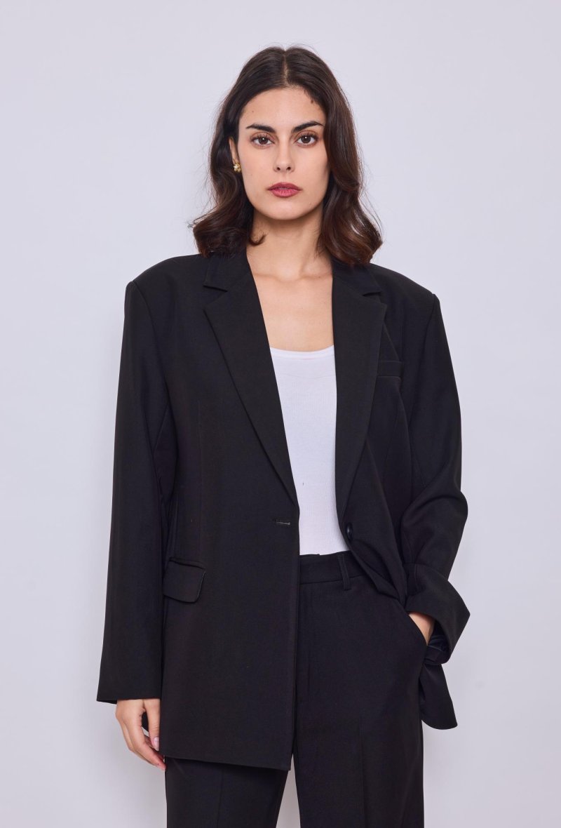 Veste avec ouverture dans le dos