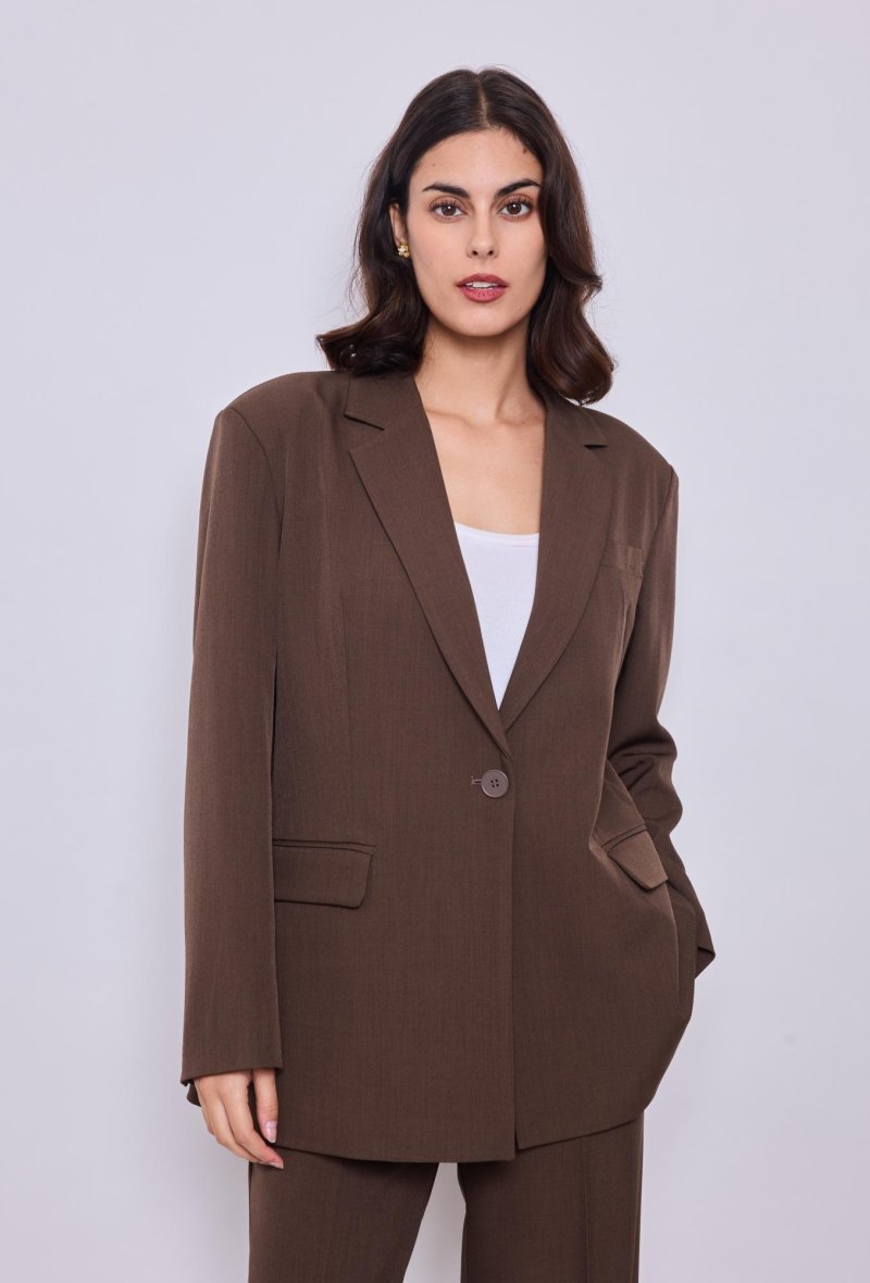 Veste avec ouverture dans le dos